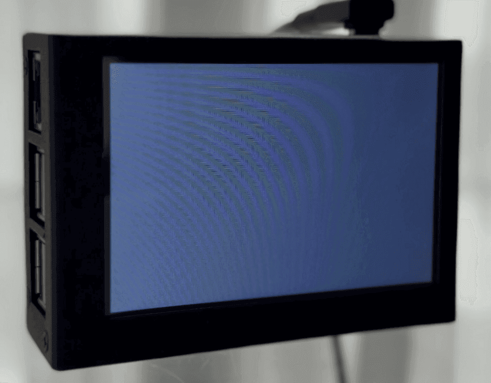 The PuriFi screen lit bright and blank during the first seconds of start-up.