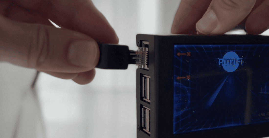 The Ethernet cable being plugged into PuriFi’s built-in Ethernet port.
